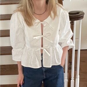 100%Cotton Bow Tie Front Shirt with Puff Sleeves.This item is new and never worn